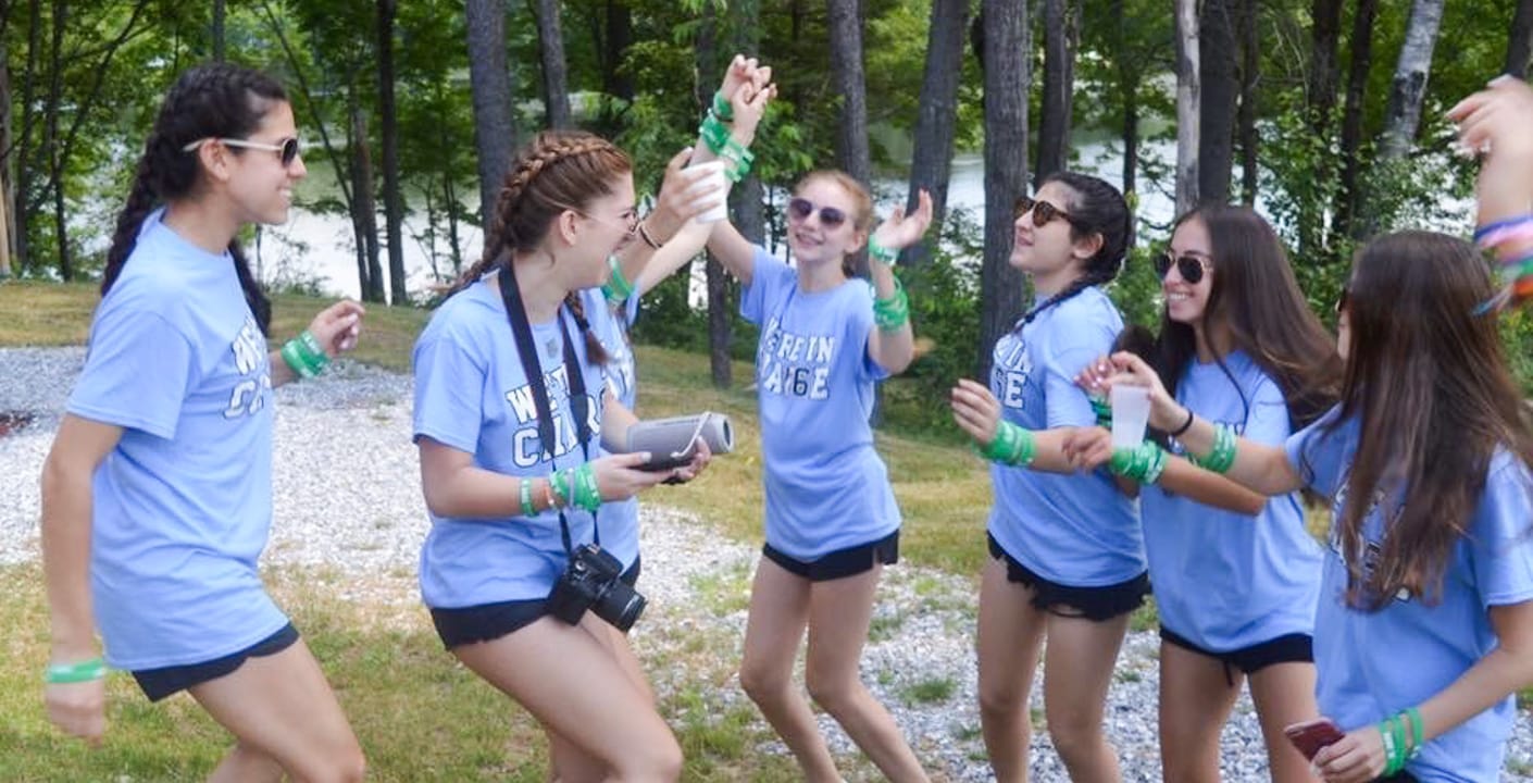 Julia dancing with friends outside