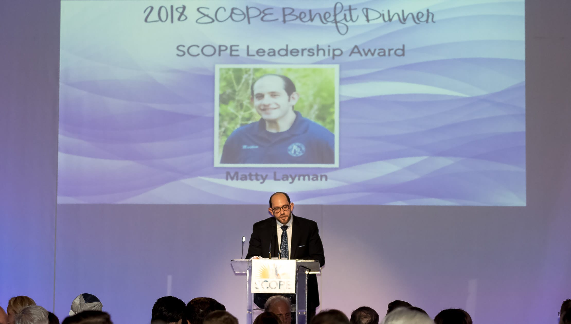 Matty speaking at SCOPE Benefit Dinner